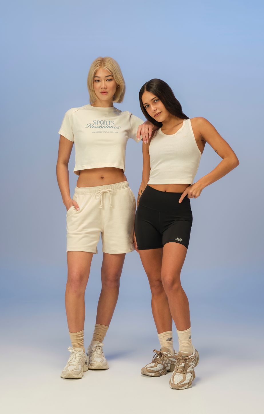 Two women wearing 9060s